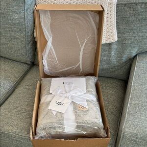 Brand new UGG Seal Throw Blanket